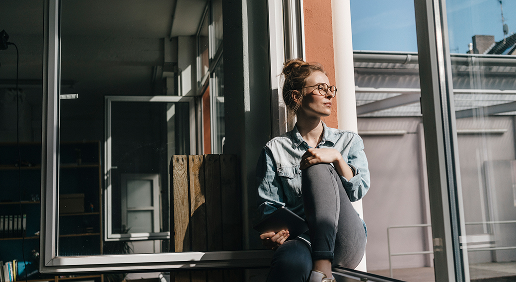 woman-looking-out-the-window